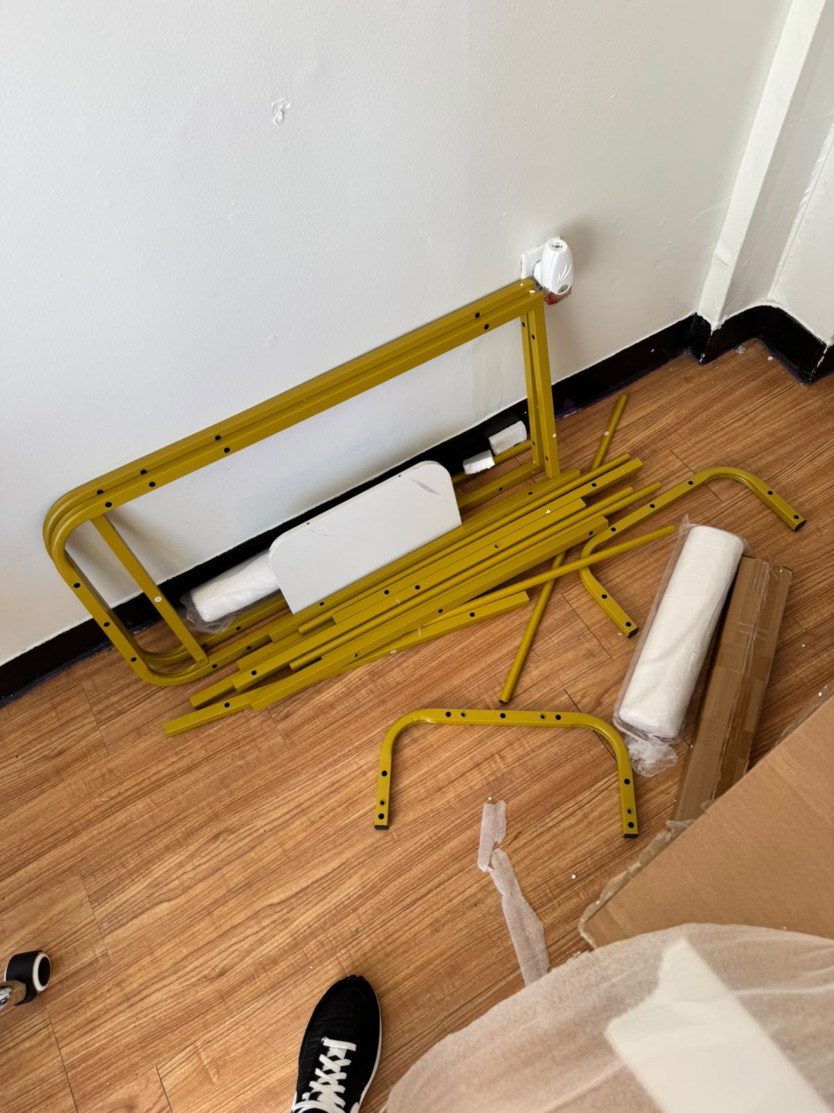 Parts laid out before assembling a nail table